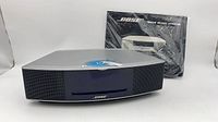 Front view of Bose Wave Music System with accessories