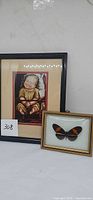 Both framed items side by side