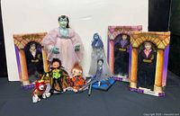 Group shot of all dolls and figures