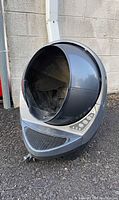 Front angled view of Litter-Robot 3 showing globe opening and control panel