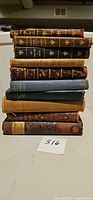 Full stack of nine vintage and antique books