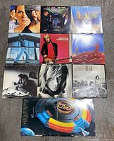 Full view of all 10 record albums laid out