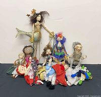 Group shot of all dolls showing variety and condition