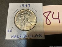 Obverse view of 1947 Walking Liberty half-dollar in holder