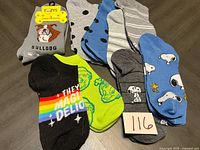 All six pairs of socks spread out showing designs and Fozys tag