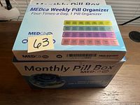 Weekly and monthly pill box packages