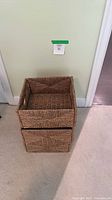 Three woven baskets stacked to show size and shape