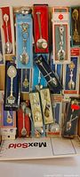 Assorted boxed spoons stacked in shipping box