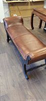 Full view of leather bench top and frame