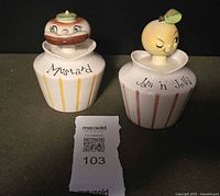 Both condiment jars side by side showing overall design and lettering