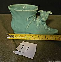 Full side view showing entire planter and measuring tape indicating length