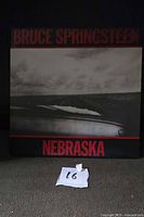 Front album cover showing title and artist