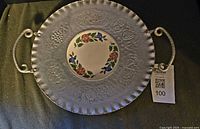 Top view of tray showing aluminum body, porcelain center insert and handles