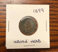 Obverse of 1899 Indian Head penny in coin flip