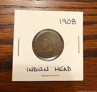 Obverse of 1908 Indian Head cent in cardboard flip