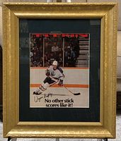 Full view of framed Titan advertisement featuring Wayne Gretzky