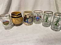 Six mugs/glasses arranged side by side