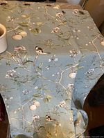 Full view of patterned curtain panel spread out