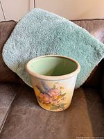 Bin and bath mat together showing overall appearance