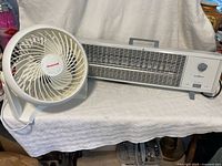 Honeywell table fan and Mastercraft heater side by side