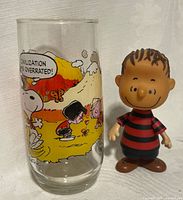 Glass and Linus figure front view