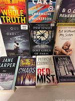 Front view of nine paperbacks showing covers and titles