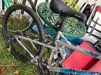 Drive side view showing rear suspension, drivetrain and rear wheel