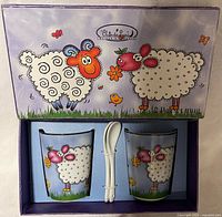 Closed box showing cartoon sheep design and contents through window