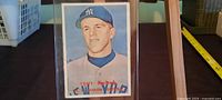 Front of 1957 Topps Tony Kubek rookie card in case