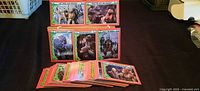 Fronts of several TMNT II cards and full stack