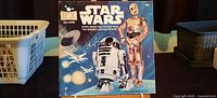 Front cover showing title, catalogue number 450, images of R2-D2 and C-3PO
