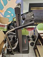 Side view of folded ProForm treadmill