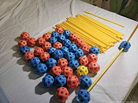 Connector balls and rods laid out on sheet