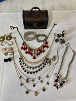 Full layout of jewelry items and treasure chest box