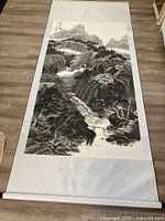 Full length view of rolled-out silk scroll painting