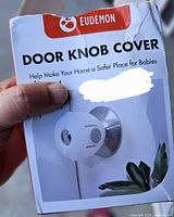 Front of Eudemon door knob cover box showing product image and branding