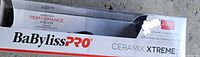 Front of boxed BaBylissPRO Ceramix Xtreme curling iron showing branding and temperature rating