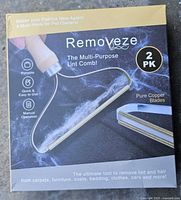 Front of sealed Removeze 2-pack lint comb box