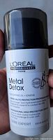 Front of L’Oréal Metal Detox bottle showing label and size