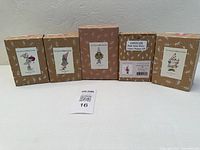 Five ornament boxes front view