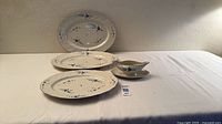 Overall lot with three oval platters and gravy boat