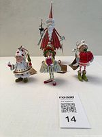 All four items: 12 in Santa figure and three 4 in elf ornaments