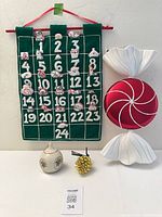 Group shot of advent calendar, glass peppermint, Lenox pomander, Michael Aram pinecone