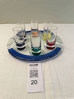 Full set of six colored-base cordials arranged on fused glass tray