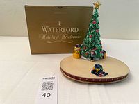 Full view of Waterford music box beside original branded box