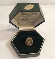 Ring in open presentation box