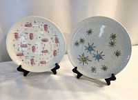 Front view of both plates on stands