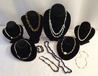 Full lot overview showing all necklaces and bracelets