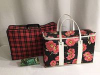 Group shot showing all three items: floral picnic bag, plaid case, eyeglass case