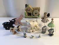 Group shot of all thirteen ceramic items laid out